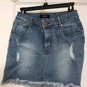 Ripped Denim skirt.